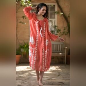 Flowy Red Dress with White Floral Design